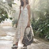 White Hollow Lace Embroidery Ball Tassel Stitching Irregular Strap Floral Maxi Dresses