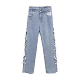 Irregular hollow out lace up zip-up button jeans