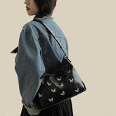 Butterfly applique PU leather ruched handbag