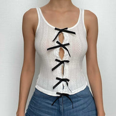Bowknot hollow out contrast sleeveless textured cut out top
