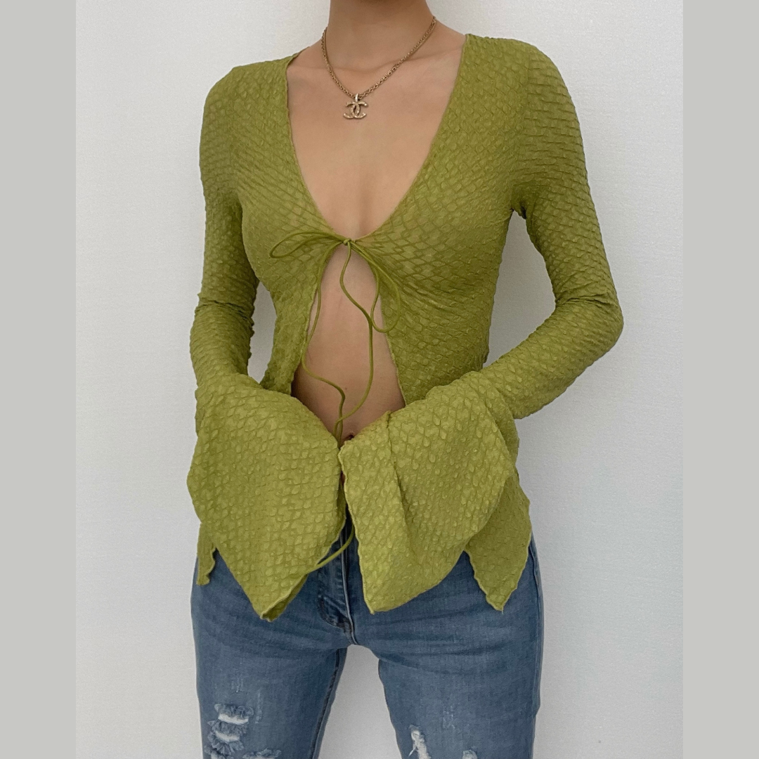Textured solid slit flared sleeve ruffle self tie crop top