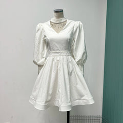 Kimberly Spliced Tassel Mini Dress