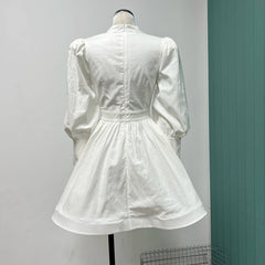 Kimberly Spliced Tassel Mini Dress