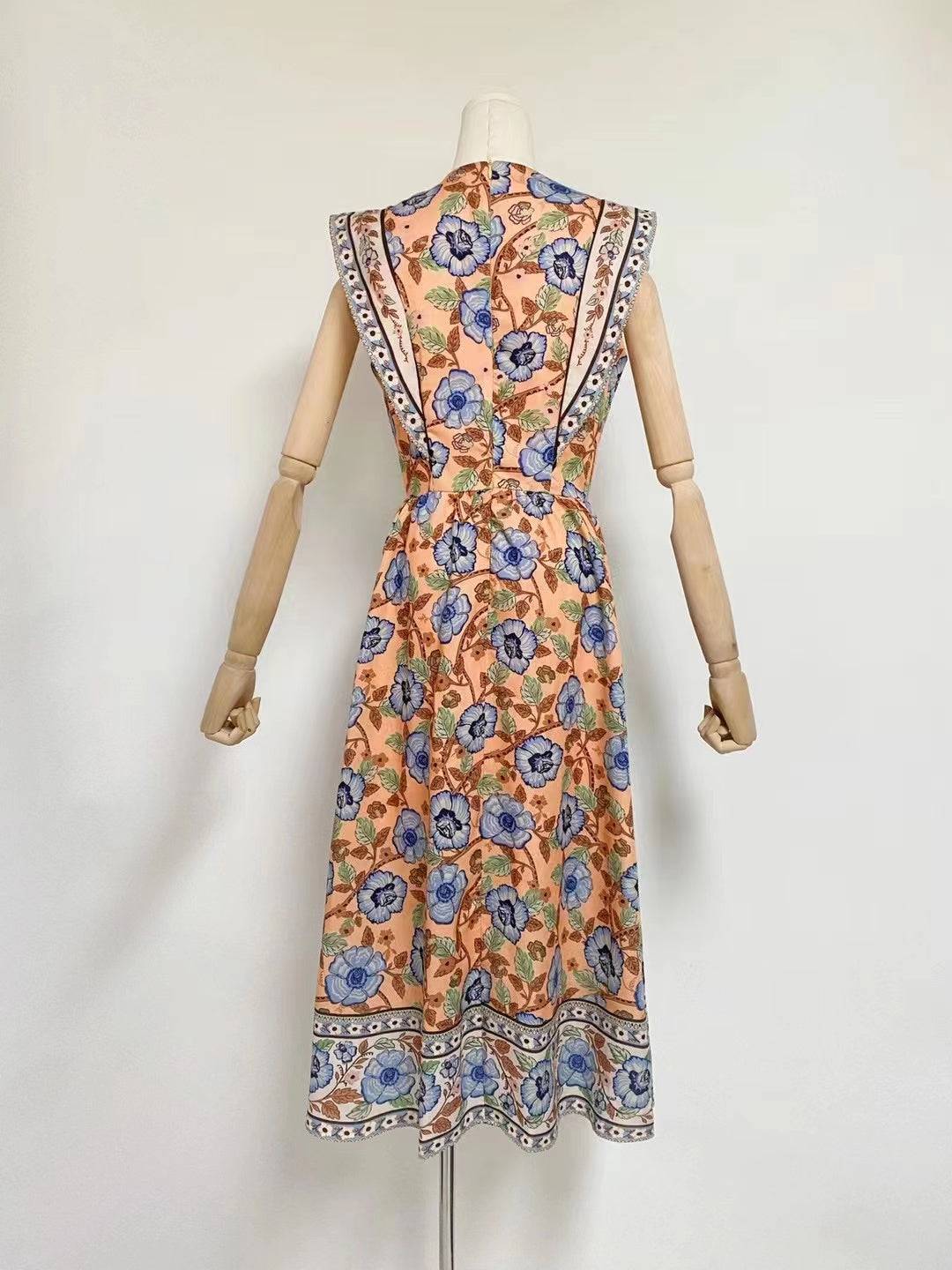 Theodora Sleeveless Round Neck Floral Midi Dress