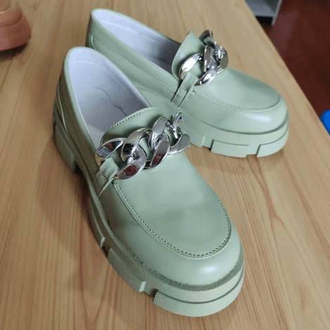Hattie Cowhide Metal Chain Embellishment Slip-On Shoes