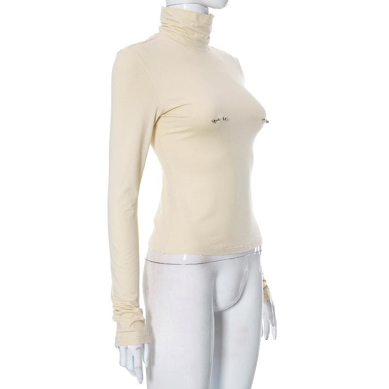 Metal applique turtle neck long sleeve solid top