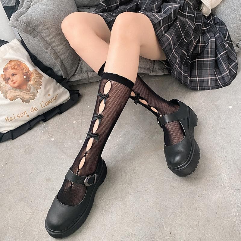 Solid bowknot hollow out long socks
