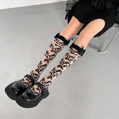 Butterfly applique faux pearl knee high socks