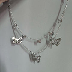 Butterfly pendant layered chain necklace