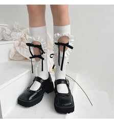 Hollow out bowknot ruffle irregular knee high socks