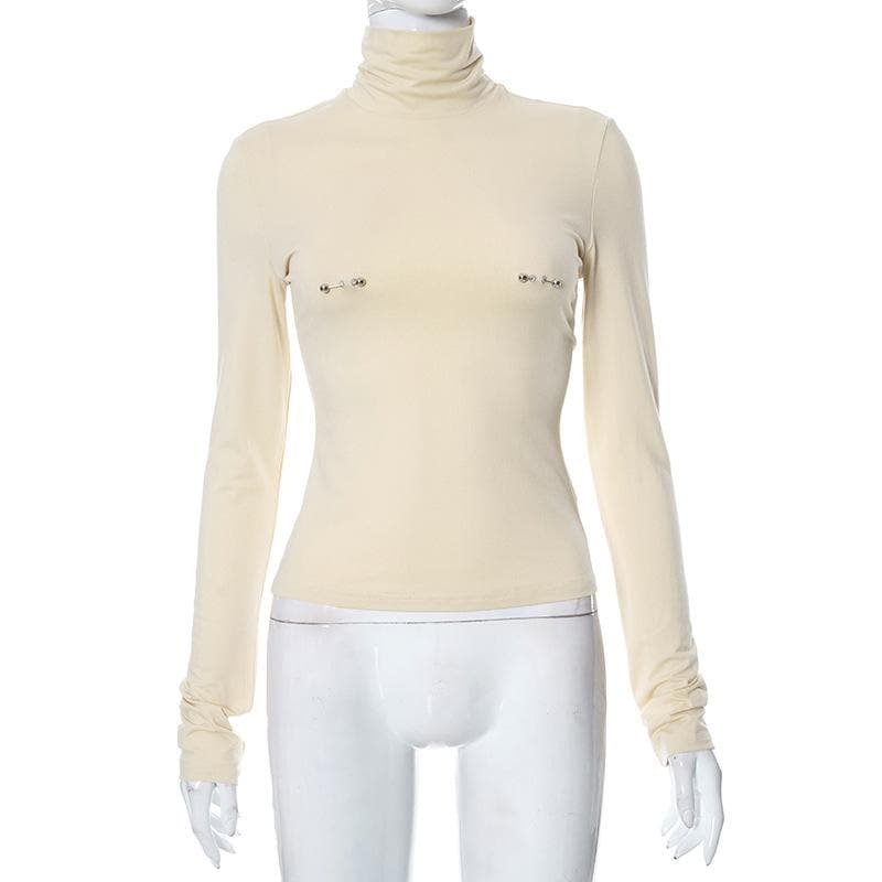 Metal applique turtle neck long sleeve solid top
