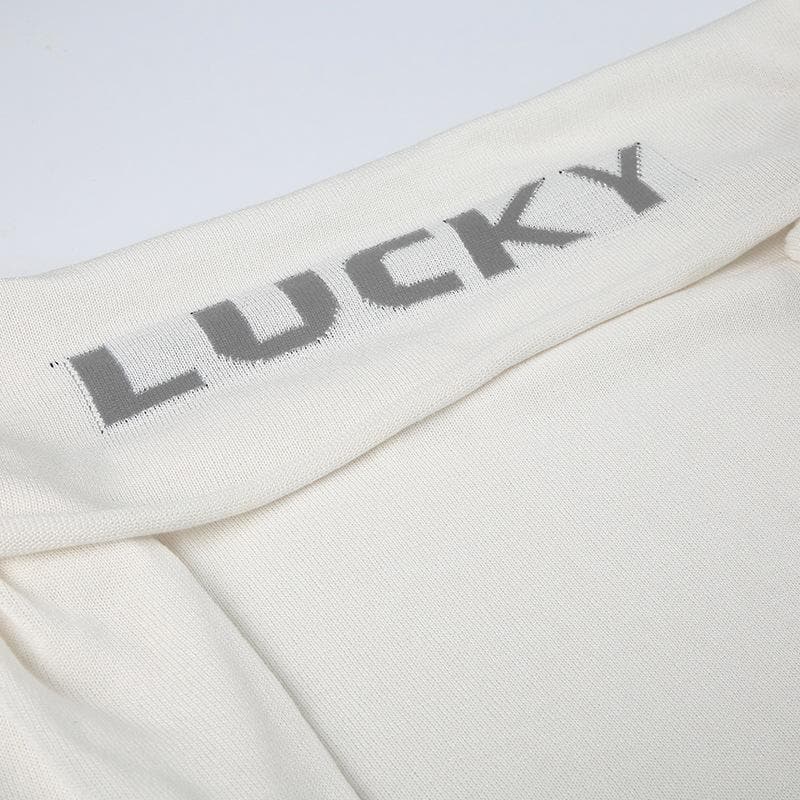 Off shoulder "LUCKY" pattern long sleeve top
