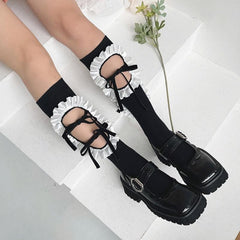 Hollow out bowknot ruffle irregular knee high socks