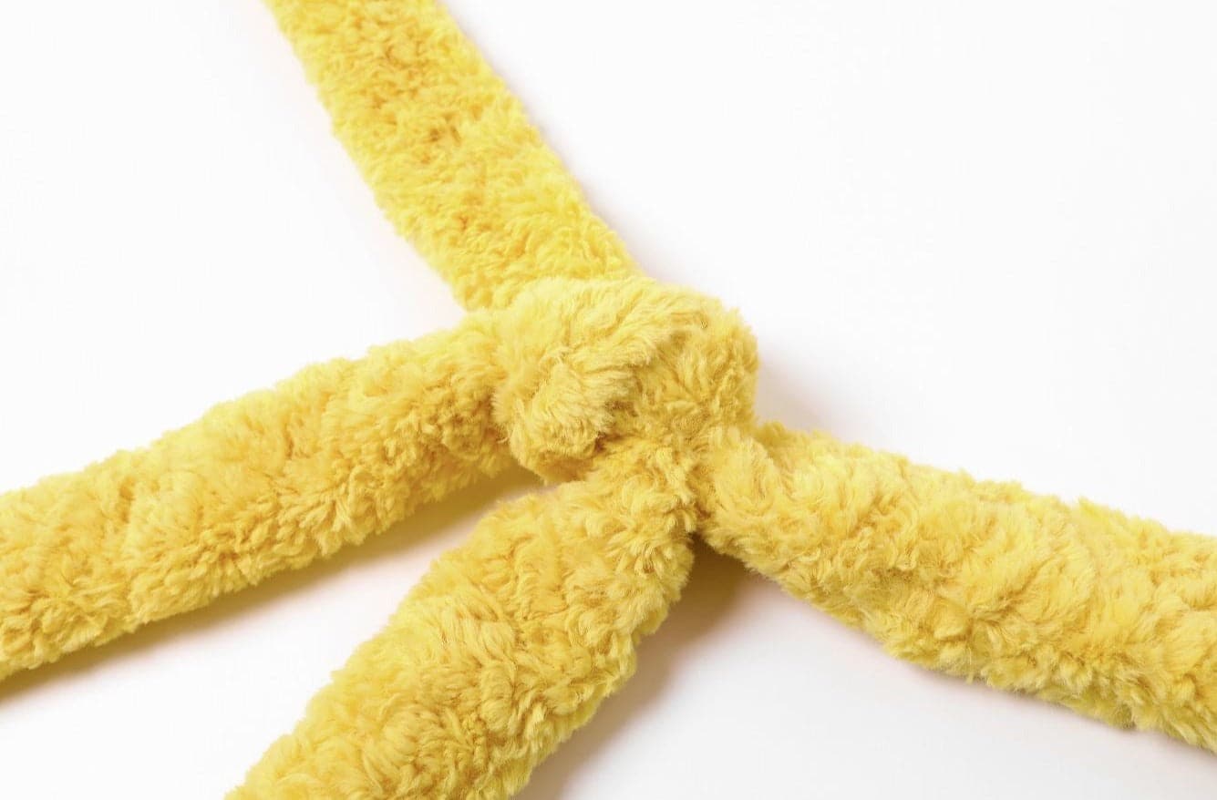 Star solid fluffy knotted zip-up bag