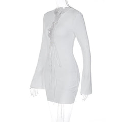 Lace up solid long sleeve ribbed self tie mini dress