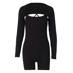 Solid ribbed cross back long sleeve shrug romper