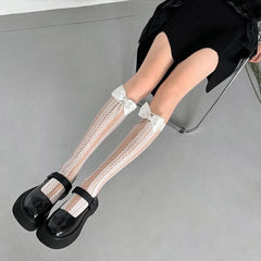 Bowknot polka dot hollow out knee high socks
